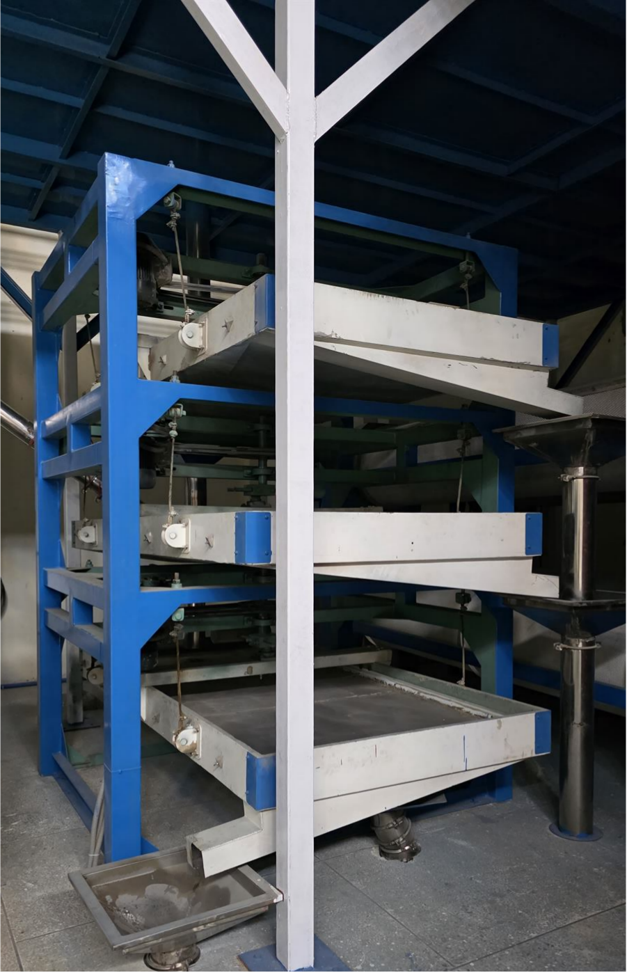Rice separator machinery inside the mill line.